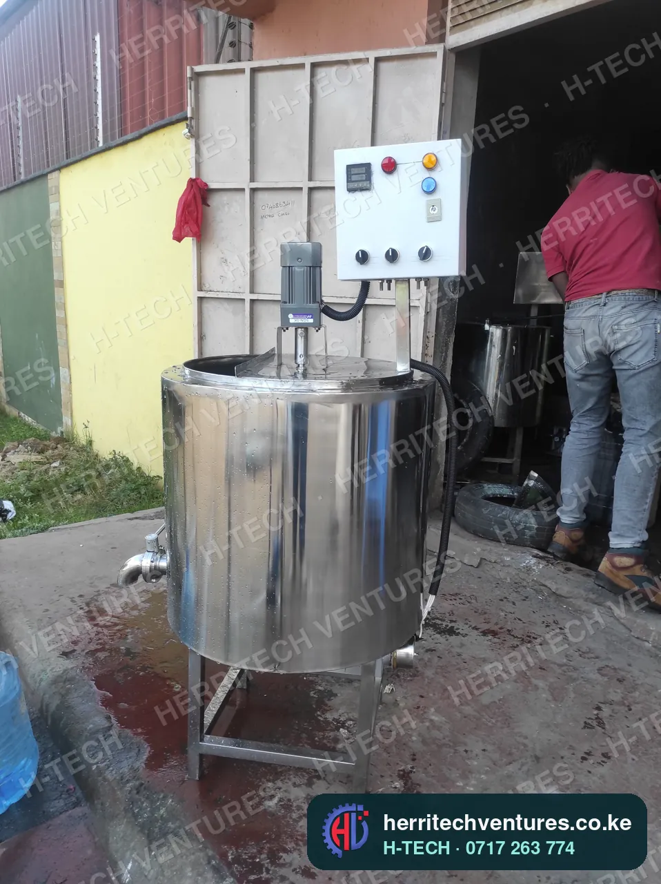A finished milk pasteurizer: stirrer motor and control panel, August 2024