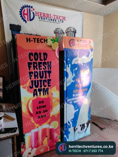An H-TECH fruit juice ATM next to a milk ATM in our showroom, June 2022