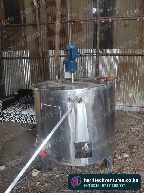 A large H-TECH milk pasteurizer with its agitator motor, September 2022