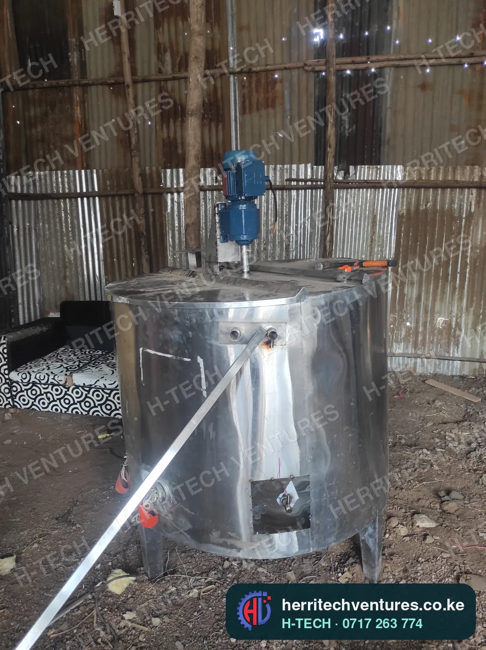 A large H-TECH milk pasteurizer with its agitator motor, September 2022