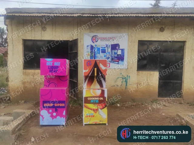 A liquid soap ATM and a cooking oil ATM outside our workshop, July 2022
