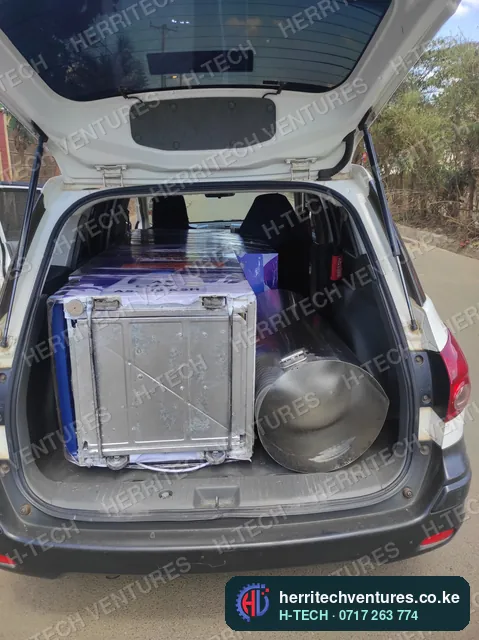 A machine and its stainless tank loaded for delivery, October 2022