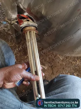 Checking an immersion heating element before fitting it to a milk pasteurizer, September 2022