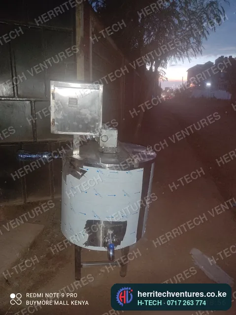 An H-TECH batch milk pasteurizer: jacketed stainless vat, stirrer motor, outlet valve and control box, March 2022