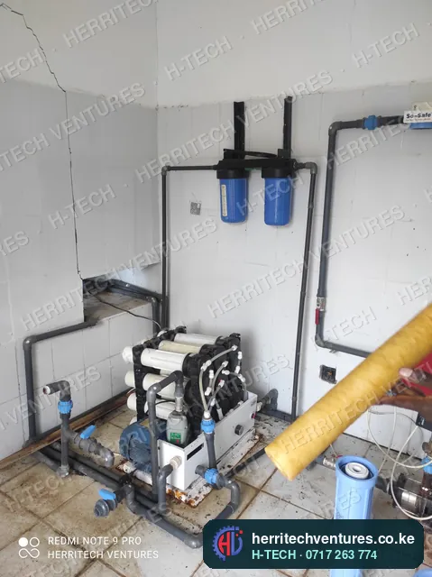 The treatment room: RO unit, booster pump and jumbo filter housings plumbed in, December 2021