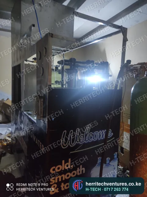 Fitting the branded front panels to the refilling station, December 2021