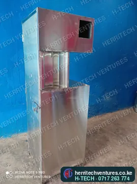The stainless cabinet with its dispensing bay and controller cut-out, December 2021