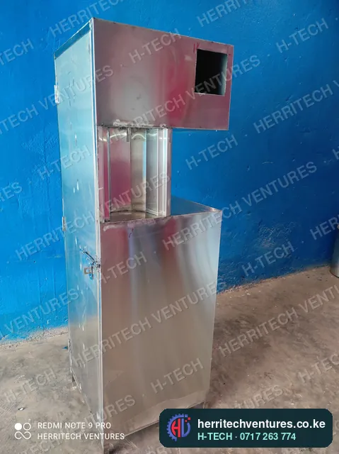 The stainless cabinet with its dispensing bay and controller cut-out, December 2021