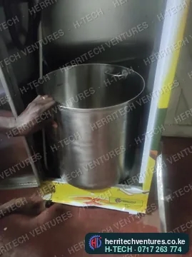 Fitting the stainless oil tank inside a cooking oil ATM, July 2022