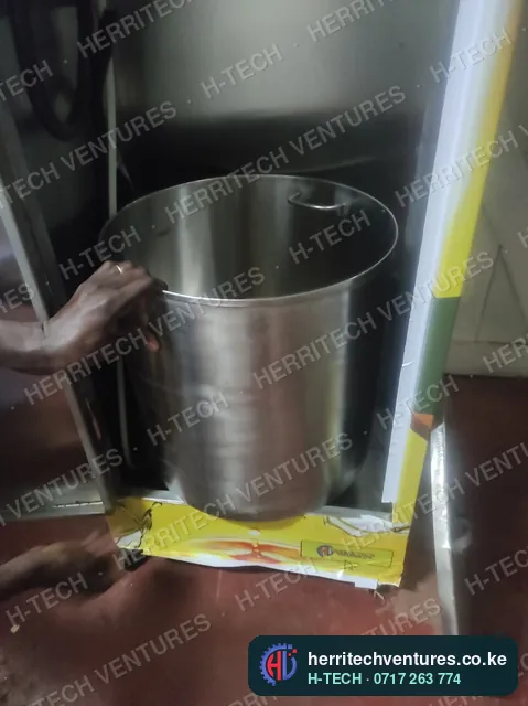 Fitting the stainless oil tank inside a cooking oil ATM, July 2022
