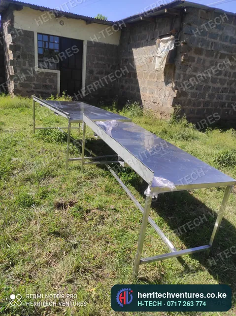 The stainless tables still in their protective film, January 2022
