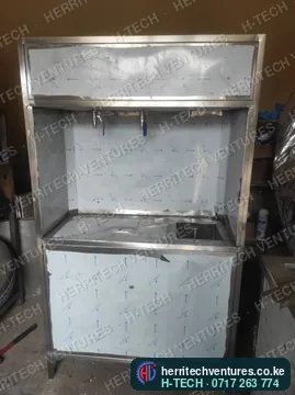 A stainless water vending cabinet fresh from fabrication, August 2022
