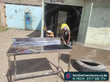 A stainless work table being finished, October 2024