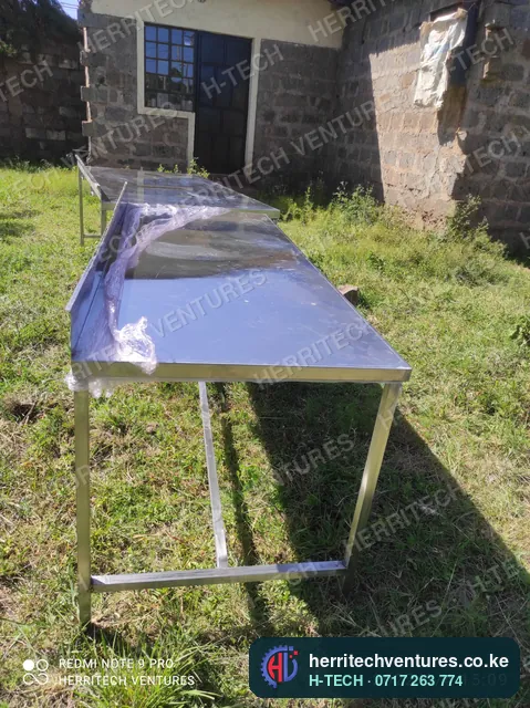 A finished stainless work table: welded frame, under-rail and top, January 2022