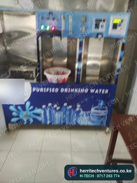 A branded water refilling station with three refill bays, July 2022