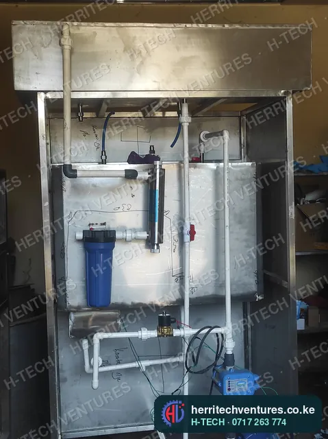 UV sterilizer, filter housing and pipework inside a water station, August 2022