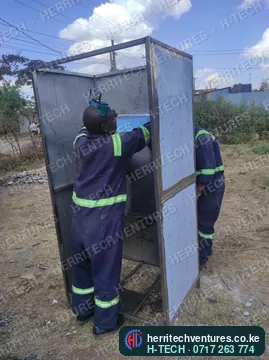 Our team welding a stainless steel enclosure frame, September 2022